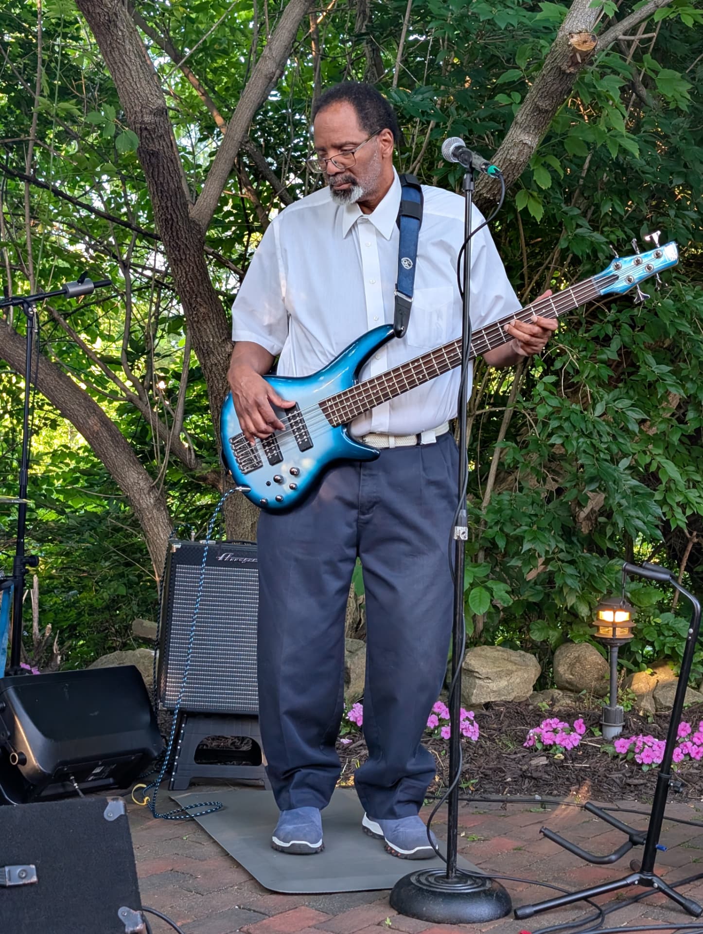 Blue Cadillac Band bassist Curt Strawder performing live outdoors